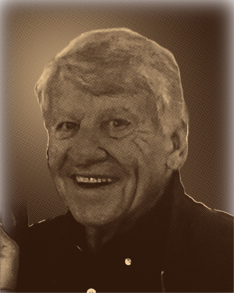 Bob smiling in a classic yearbook portrait